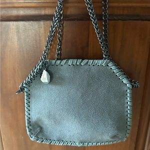 Suede crossbody purse.